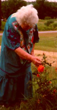 Mother Touching Flowers